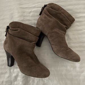 BCBG taupe heeled booties with back buckle detail. Size 7. Gently worn.